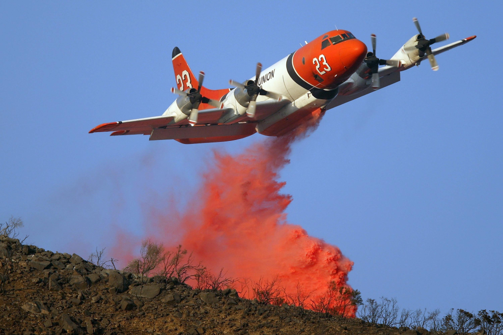 Former US Navy Lockheed P-3A Orion modified for duty as an air tanker for the US Forest Service. ( Air Tankers & Orange Stuff )